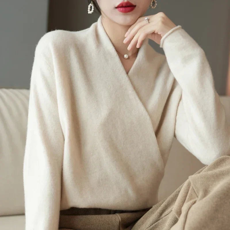 Model wearing a comfortable women's wrap neck knit top, showcasing its versatile fit and elegant style.