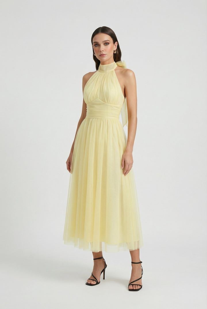 Elegant women's yellow halter neck midi dress, perfect for summer parties, bridesmaids, or special occasions.