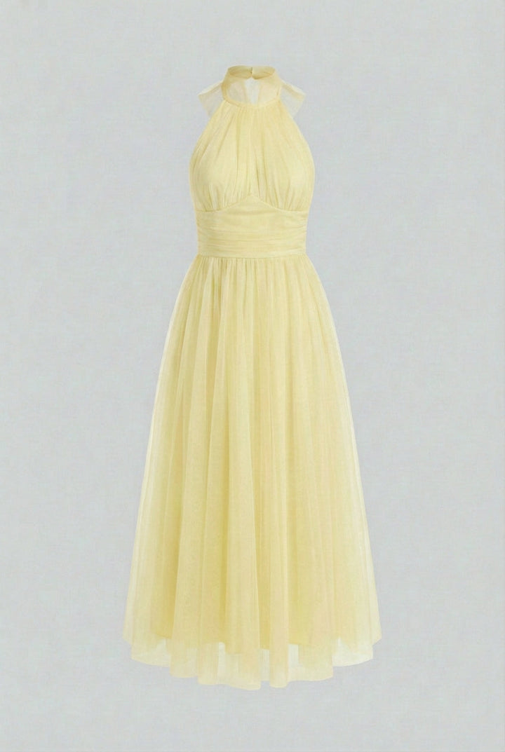 Chic women's yellow halter neck midi dress, an elegant choice for summer weddings, parties & occasion wear.