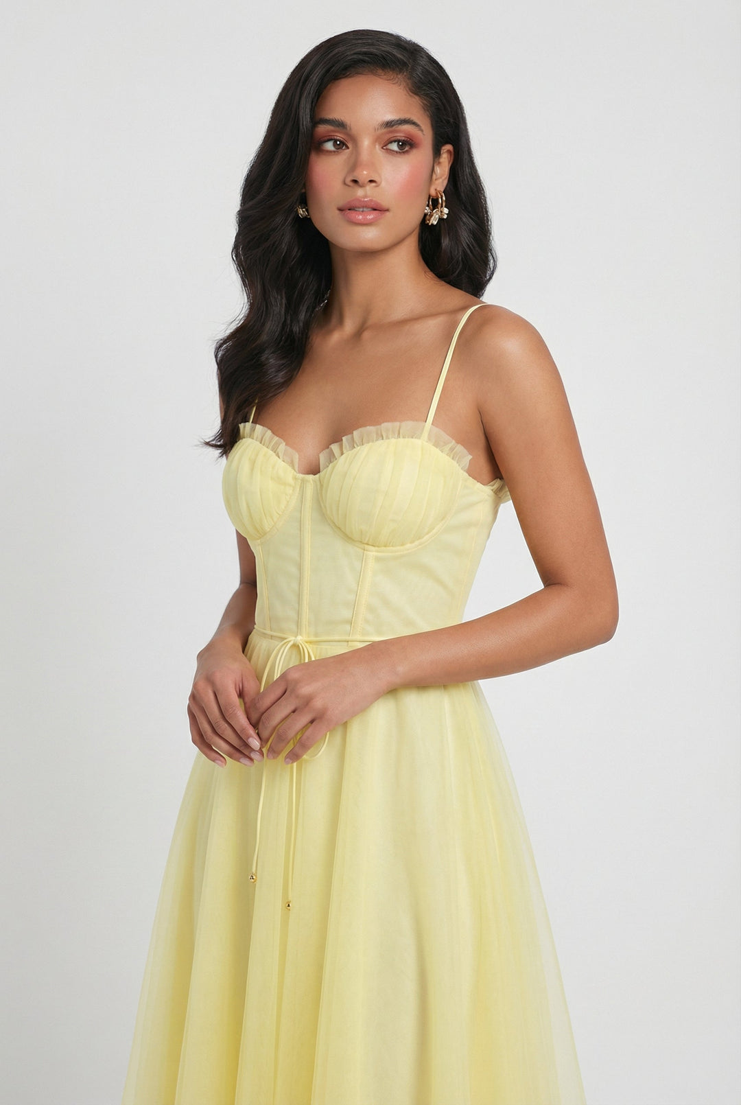 Stylish yellow A-line midi dress with corset bodice for women, ideal summer party or formal occasion wear.