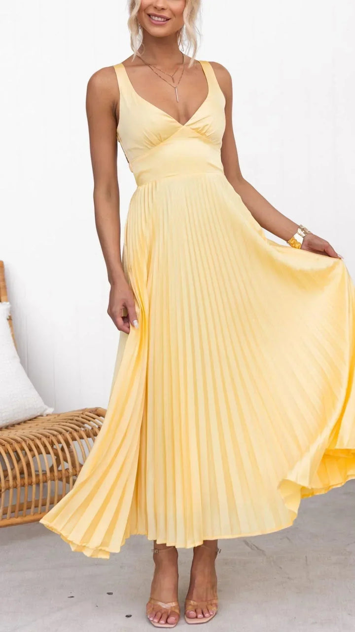 Elegant yellow pleated V-neck maxi dress for women, perfect for special occasions or casual wear