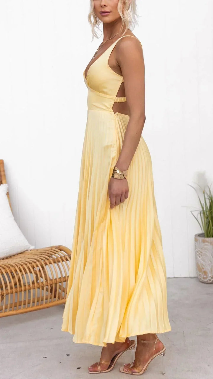 Stylish yellow pleated maxi dress featuring a flattering V-neck design for women