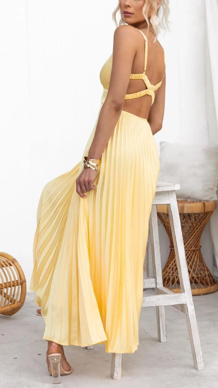Casual yet elegant yellow pleated V-neck maxi dress, a versatile women's apparel item