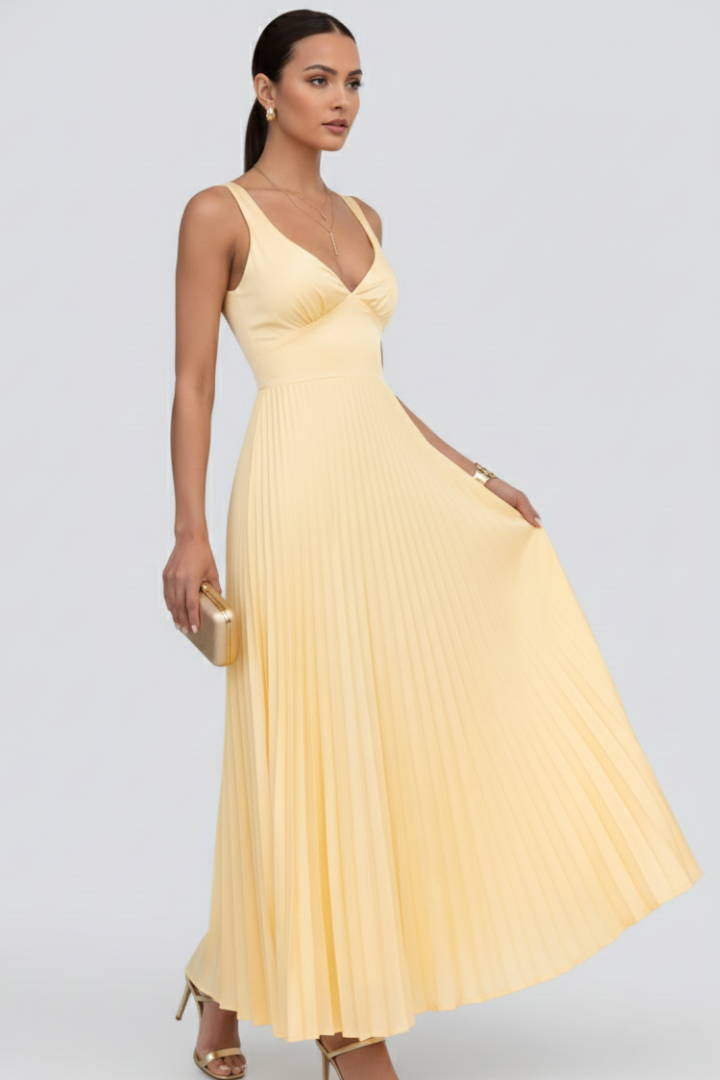 Stylish yellow pleated maxi dress with a flattering V-neck, versatile for evening or formal events