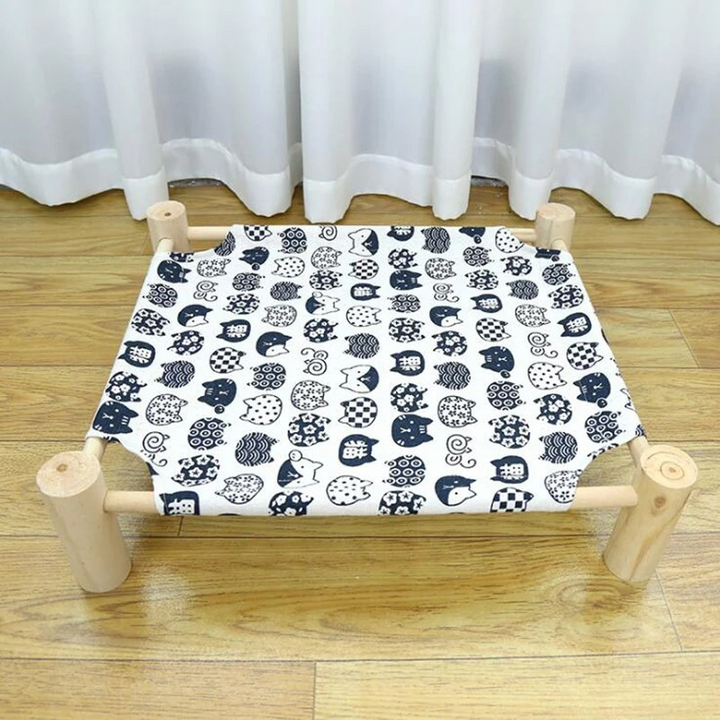 Modern elevated cat bed with breathable linen fabric for superior pet comfort. Durable & washable pet furniture.