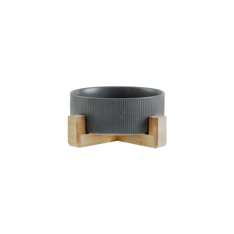 Contemporary elevated pet feeder with two white ceramic bowls & a light wooden base.