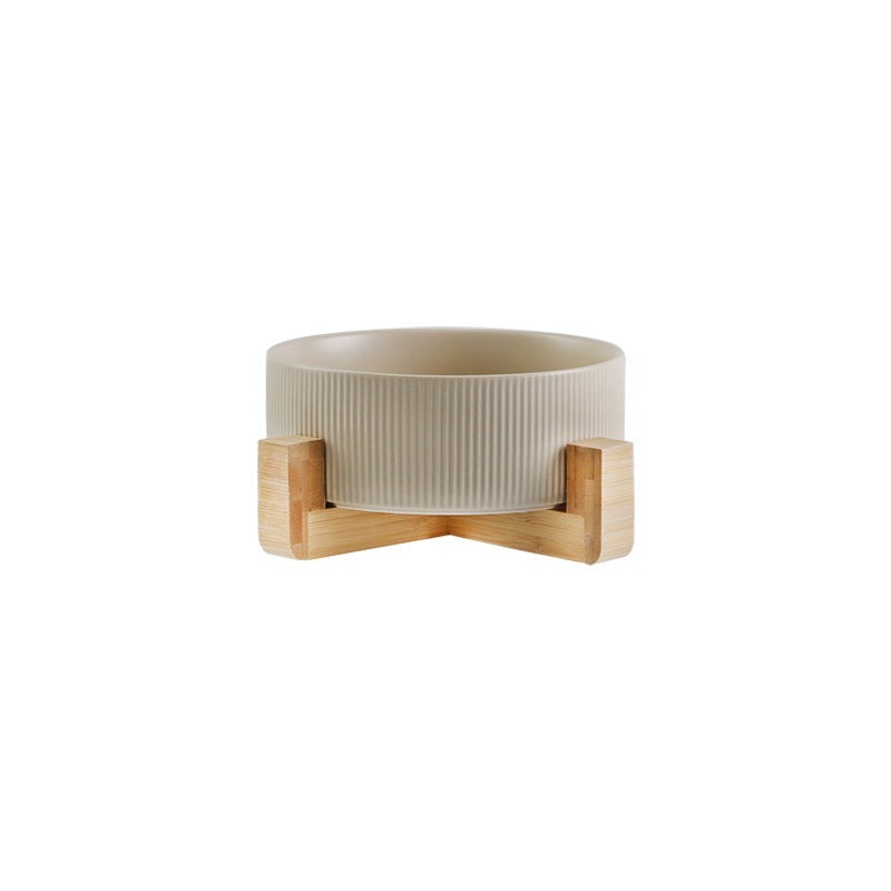 Elevated pet feeding bowls in a modern home setting, stylish wooden stand, ceramic.