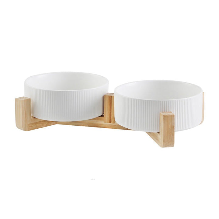 Ergonomic elevated pet food & water bowls, reducing neck strain for dogs & cats.
