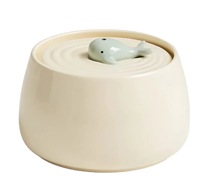 Stylish pet feeder featuring two elevated ceramic bowls with a sturdy wooden stand for cats & small dogs.