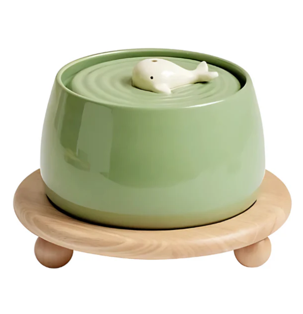 Ceramic elevated pet bowls with a minimalist wooden stand, perfect for modern pet dining & supplies.