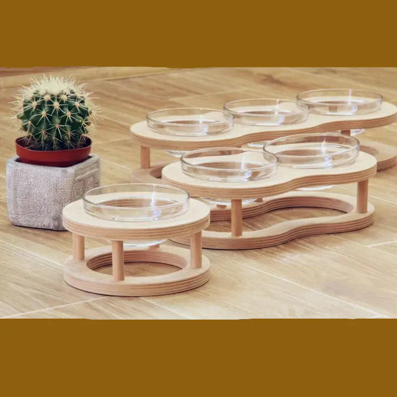 Non-slip elevated pet food bowl set with a stable wooden base for messy eaters. Prevents spills.