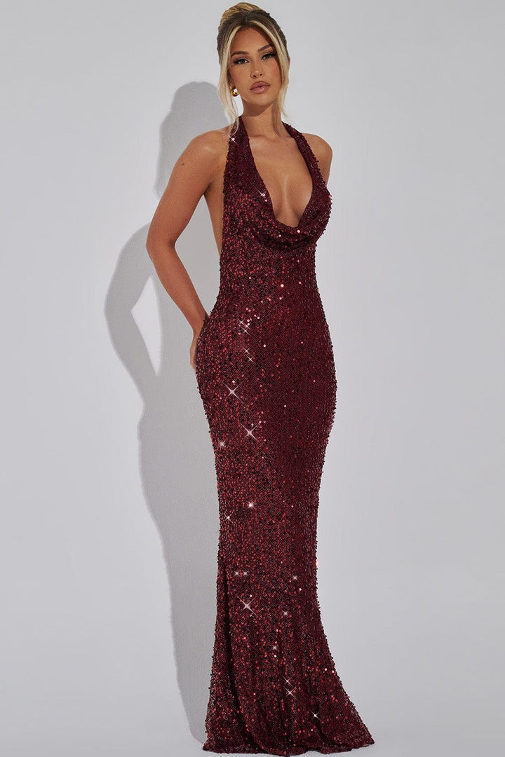 Flowing sequin evening maxi dress for women, featuring a stylish halter neckline and alluring open back.