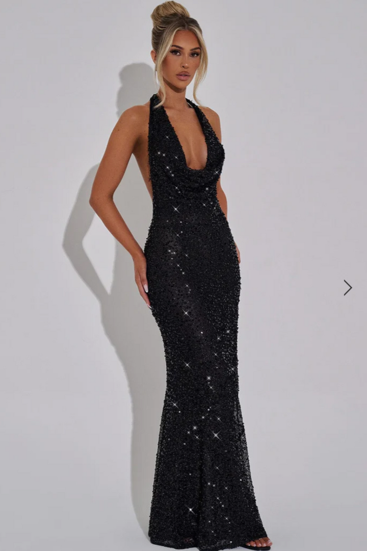 Shimmering women's sequin maxi dress with a halter neckline, ideal for gala outfits & special occasions.