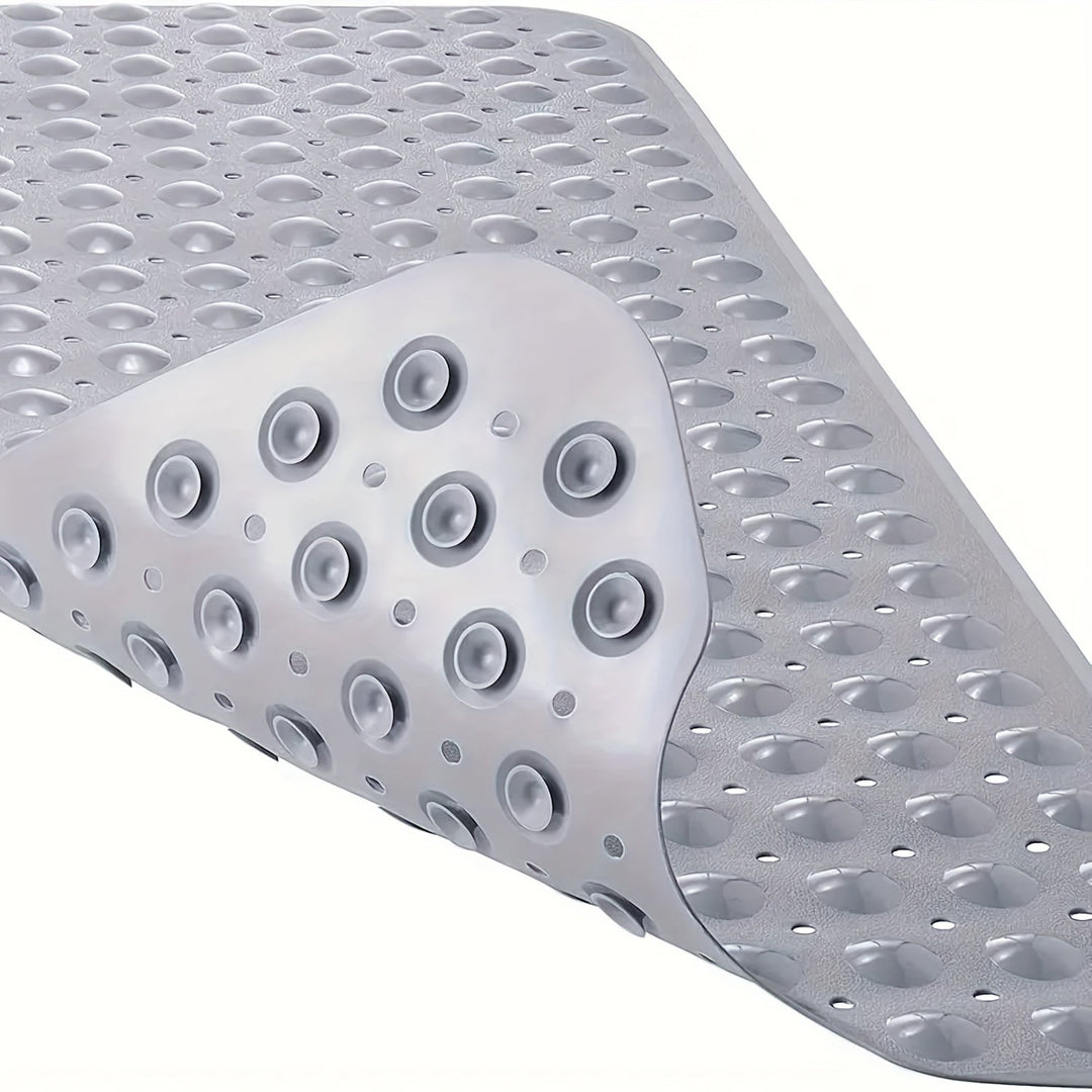 Extra long non-slip drainage mat for showers & bathtubs, boosts home safety.