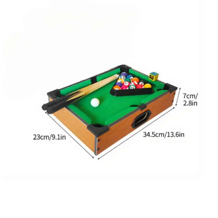 Cat playing Feline WhiskerBalls interactive billiard-style game table for engaging pet entertainment.