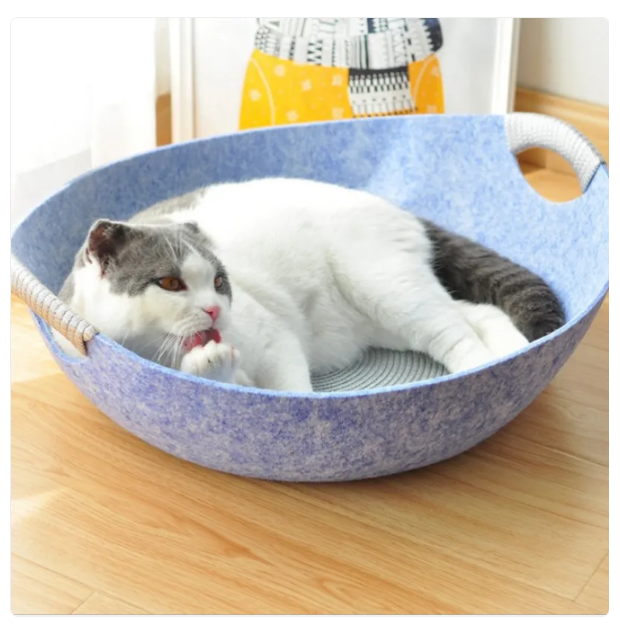 Comfortable felt cat bed: a cozy, modern pet basket for cat relaxation, blends with home decor.