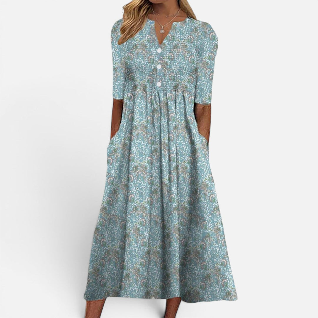 Stylish women's floral buttoned midi dress, ideal for versatile spring/summer fashion. Combines casual elegance & comfort.