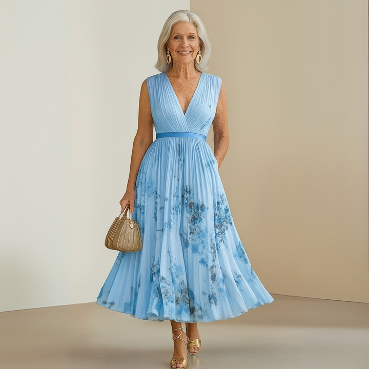 Summer-ready flowy sleeveless maxi dress for women, printed and V-neck, versatile casual wear.