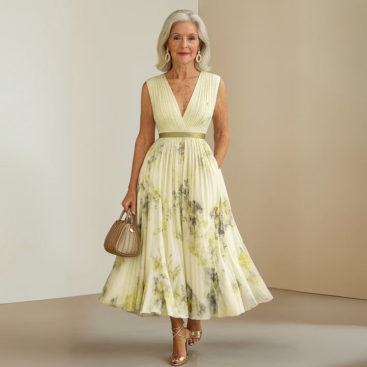 Women's printed flowy sleeveless maxi dress with a flattering V-neck, ideal for parties.