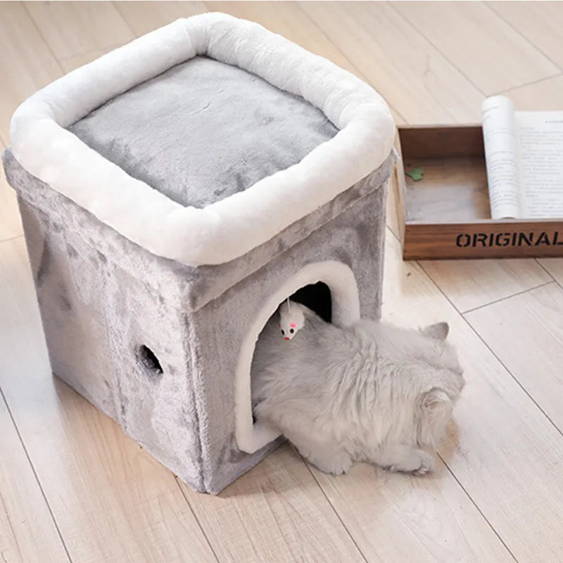 Stylish foldable cat furniture: a pet cave bed with a soft cushion & built-in interactive cat toy.