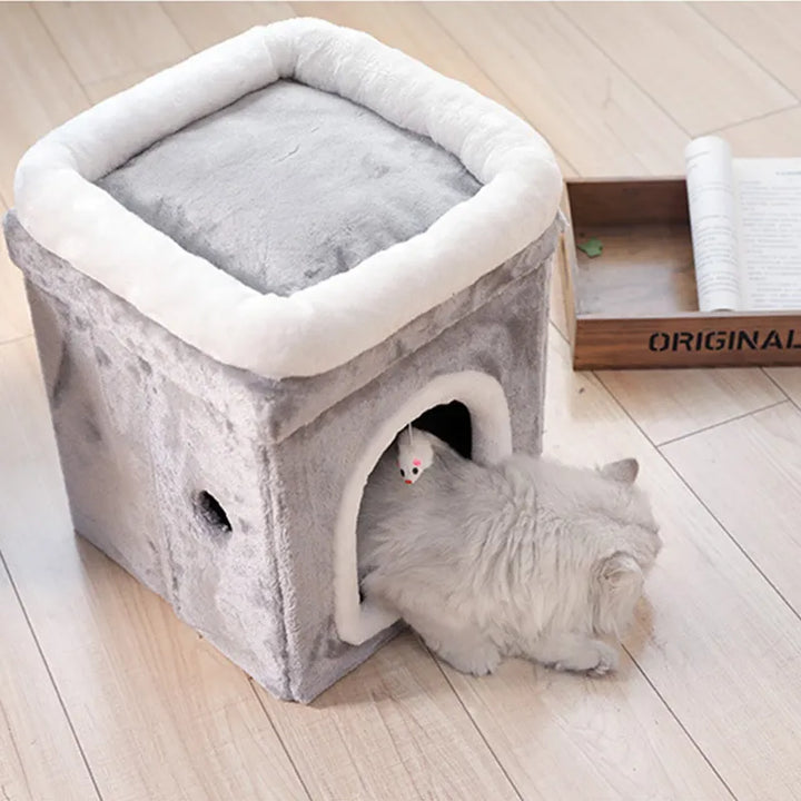 Stylish foldable cat furniture: a pet cave bed with a soft cushion & built-in interactive cat toy.