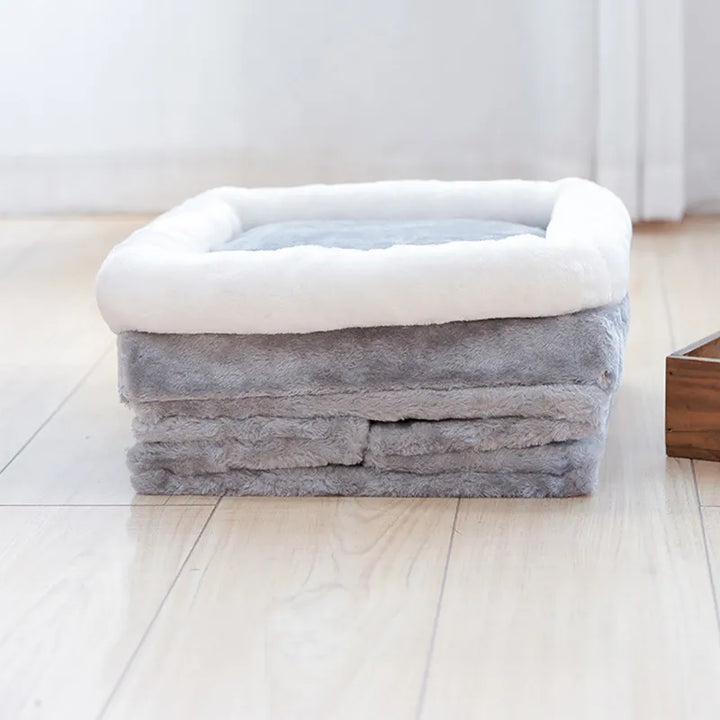 Comfortable & space-saving foldable cat cave bed for pets, includes a soft mat & playful hanging toy.