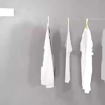 Efficiently dry clothes with this foldable double clothesline. Space-saving, stainless steel, compact laundry solution.