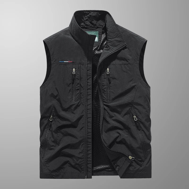 Close-up of the breathable fabric on a men's quick-dry outdoor vest with multiple pockets