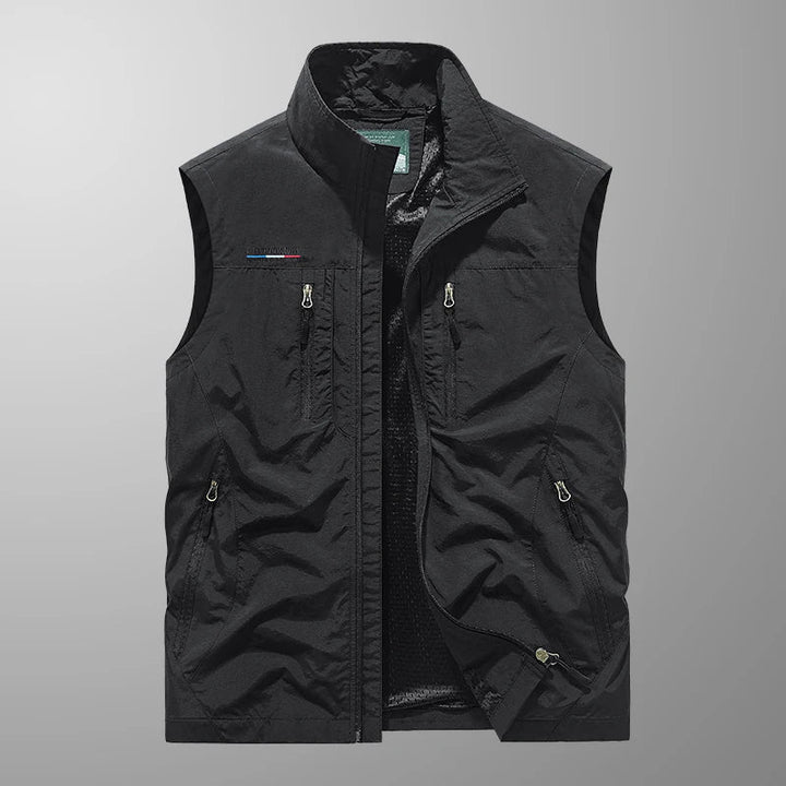 Close-up of the breathable fabric on a men's quick-dry outdoor vest with multiple pockets