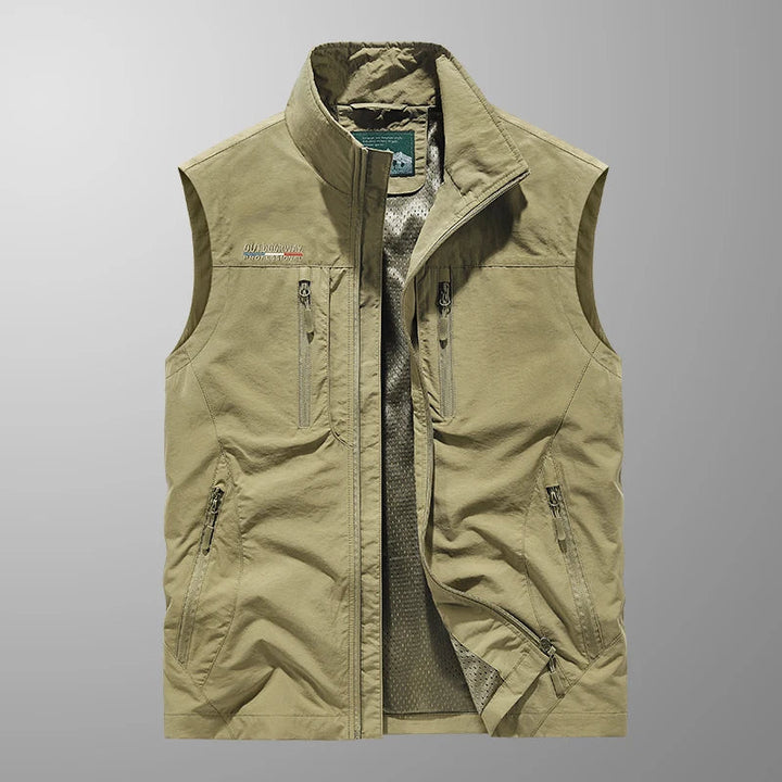 Side view of a men's travel vest, showcasing its lightweight design and numerous pockets