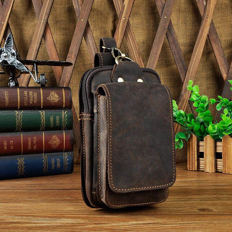 Sleek genuine leather men's waist pack. Minimalist fanny pack for modern hands-free everyday carry.