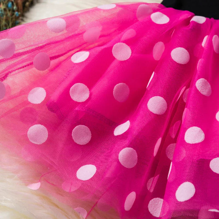 Children's Minnie Mouse costume with a vibrant red polkadot dress and classic Minnie ears headband.