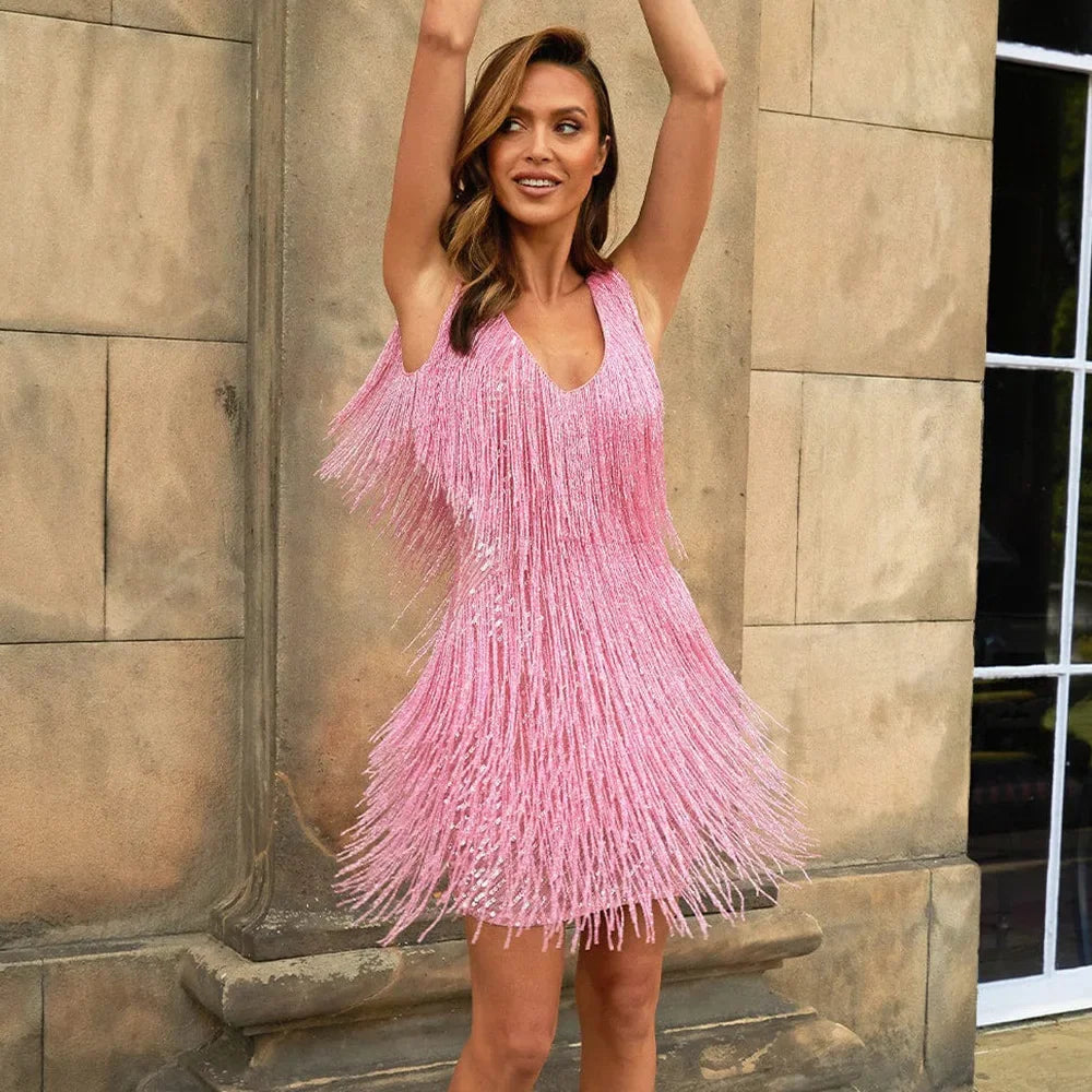 Back view of a glamorous women's fringe sequin cocktail dress for special occasion evening wear