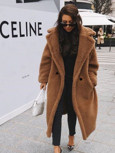 Trendy women's long winter jacket. Stylish, cozy & warm for cold weather. Elegant fashion outerwear.