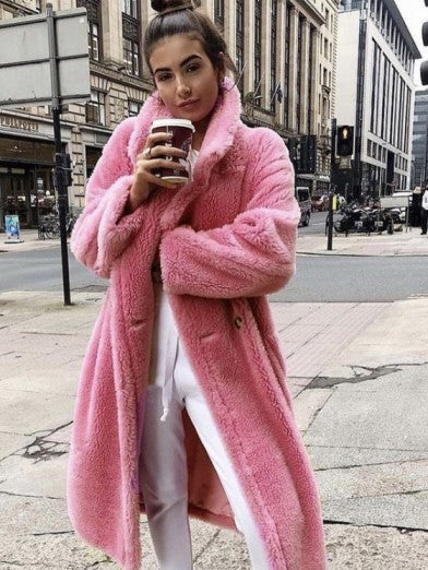 Chic women's long winter coat. Elegant, plush & warm jacket for luxurious winter fashion & cozy style.