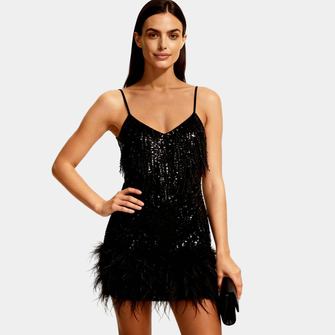 Glamorous women's sequin feather mini party dress with spaghetti straps for evening wear.