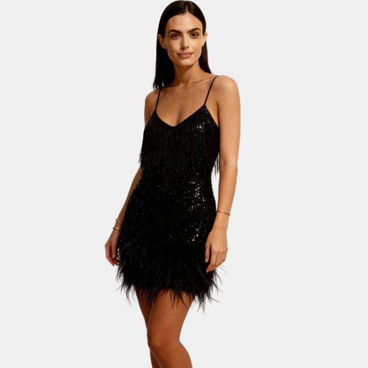 Dazzling spaghetti strap feather mini dress, a chic choice for any glamorous evening event.