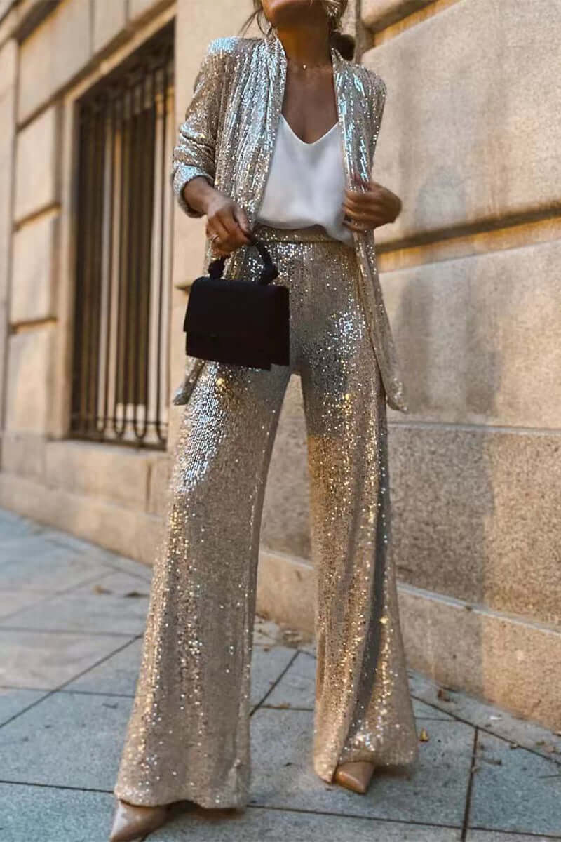 Glamorous women's sparkling sequin suit set, perfect for evening parties. Two-piece long sleeve top & wide-leg pants.