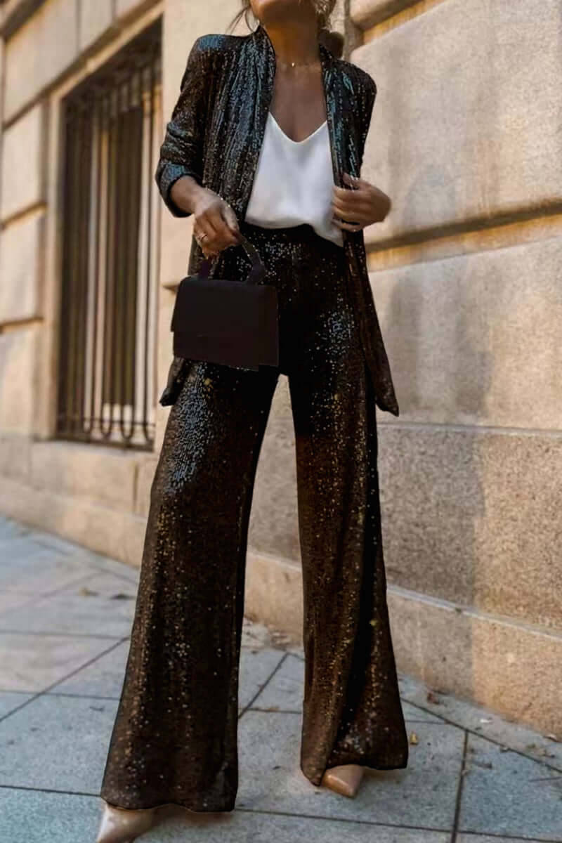 Women's dazzling sequin suit set; two-piece long-sleeve jacket & wide-leg trousers for glamorous party wear.