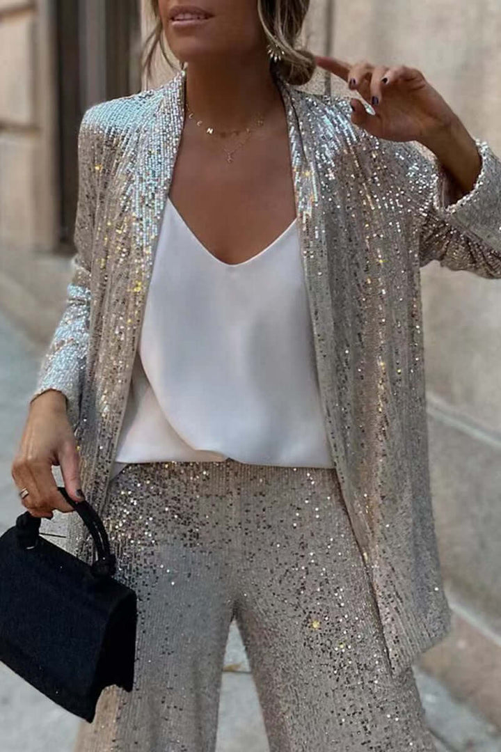 Sparkling women's sequin suit set. Perfect glamorous two-piece long-sleeve & wide-leg outfit for party occasions.