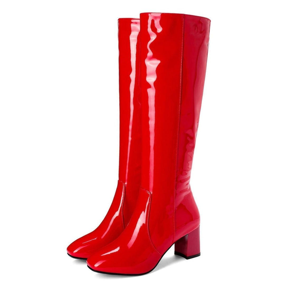 Elegant women's dress boots: black patent leather, knee-high, and high-heeled for a chic look.