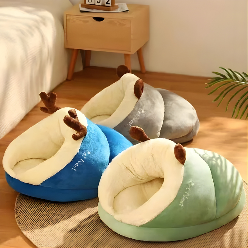Gray plush cave pet bed for cats & small dogs, offering cozy comfort & anxiety relief.