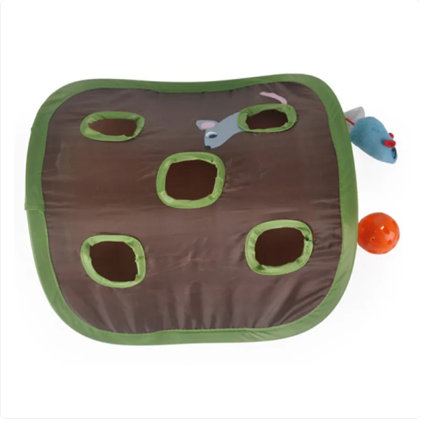 Curious cat peering from its green interactive cat tent, ready for playtime in its cozy pet cave.