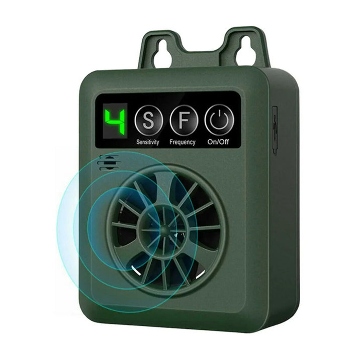 Green outdoor ultrasonic dog bark control device for humane anti-bark training. Weather-resistant pet supplies.
