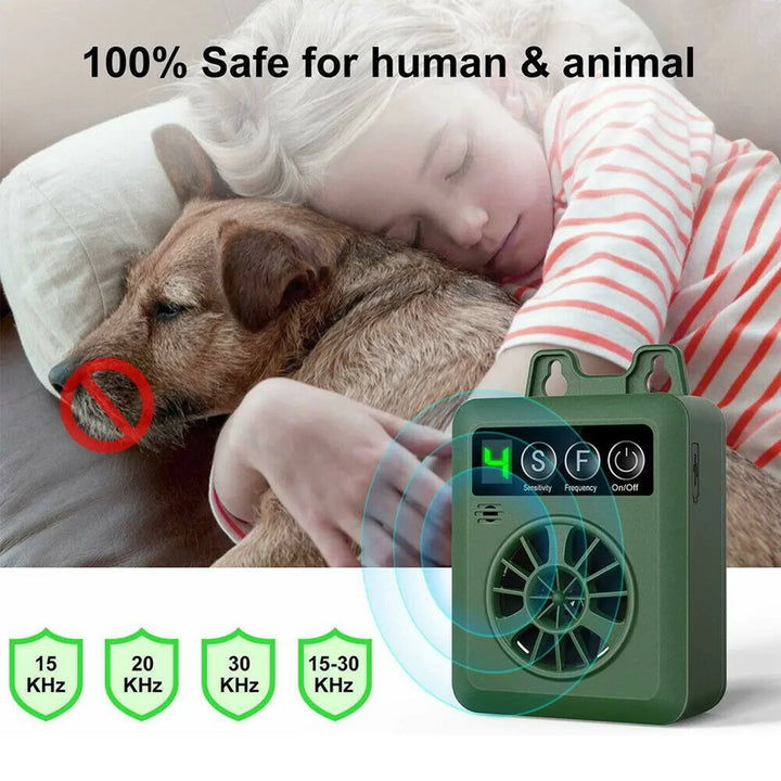 Compact green ultrasonic dog bark control device, weather-resistant for outdoor pet training.