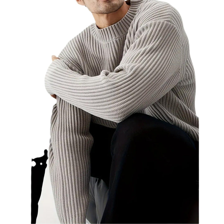 Comfortable men's grey crewneck sweater. Features a relaxed fit and long sleeves, perfect for casual everyday wear.