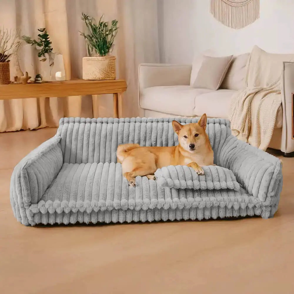 Comfortable grey corduroy orthopedic dog sofa bed, plush design for supportive pet rest. Ideal washable indoor bed.