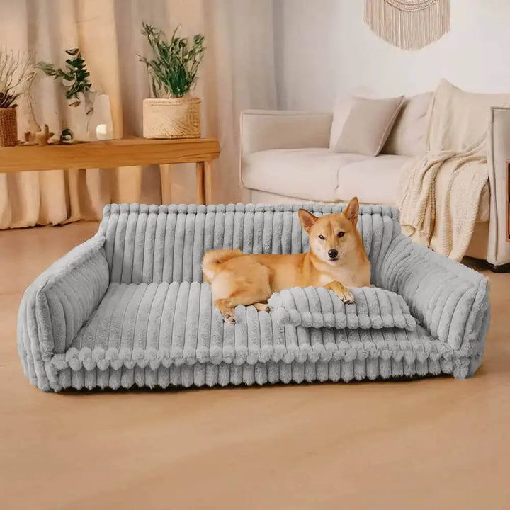 Comfortable grey corduroy orthopedic dog sofa bed, plush design for supportive pet rest. Ideal washable indoor bed.