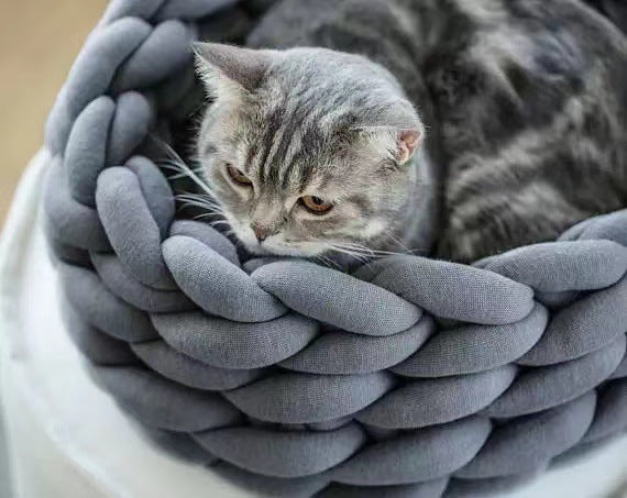 Luxury pet bed, hand-knit for ultimate cat comfort & relaxation.