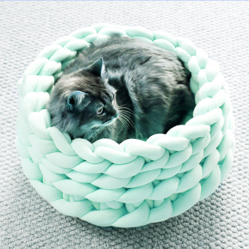 Cozy hand-woven cat bed, perfect pet furniture accessory for cats.